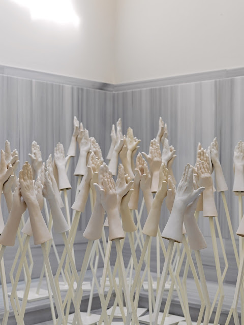 Candeğer Furtun, Applause, 2010, Ceramic Each of 33 sculptures 31 x 11 x 6,5 cm, 27 x 9 x 7 cm, exhibited as part of Healing Ruins at Zeyrek Çinili Hamam. Photograph, Hadiye Cangökçe.